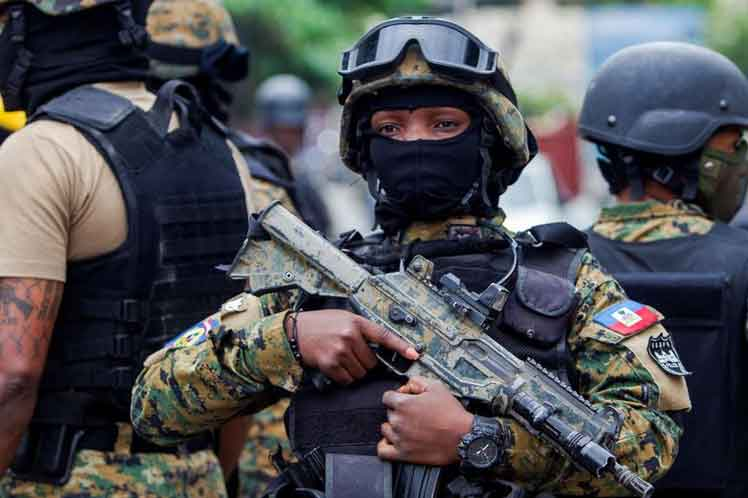 Haitian police took down two alleged gang members