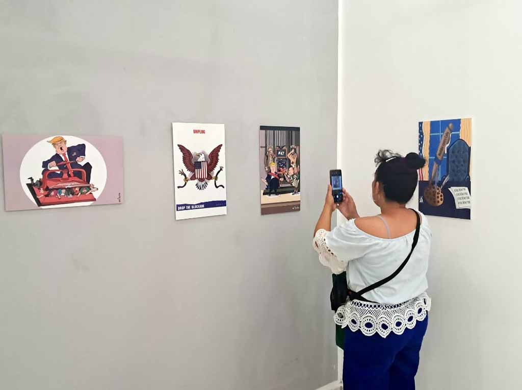 Muestra de humor gráfico en La Habana denuncia bloqueo contra Cuba