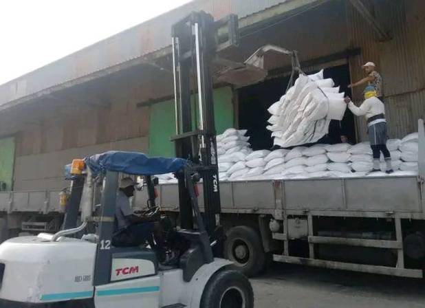 Basic supply rationing rice and wheat flour unloading in Cuban ports