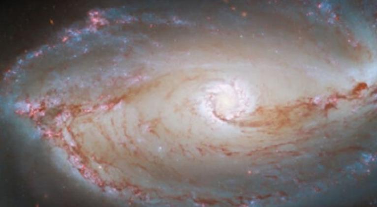 El telescopio Hubble publica una imagen de una galaxia espiral tormentosa y altamente activa